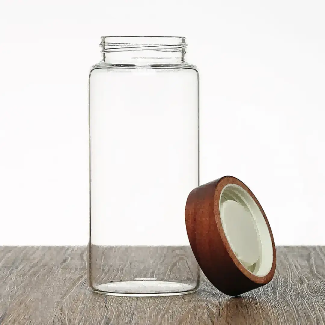 Advanced glass jar with rotating lid made of Acacia wood